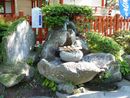 金桜神社手水鉢と青銅製の龍の水口、参拝者の身を清めます