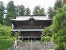 妙法寺の聖域を護る重厚な二重楼門形式の山門